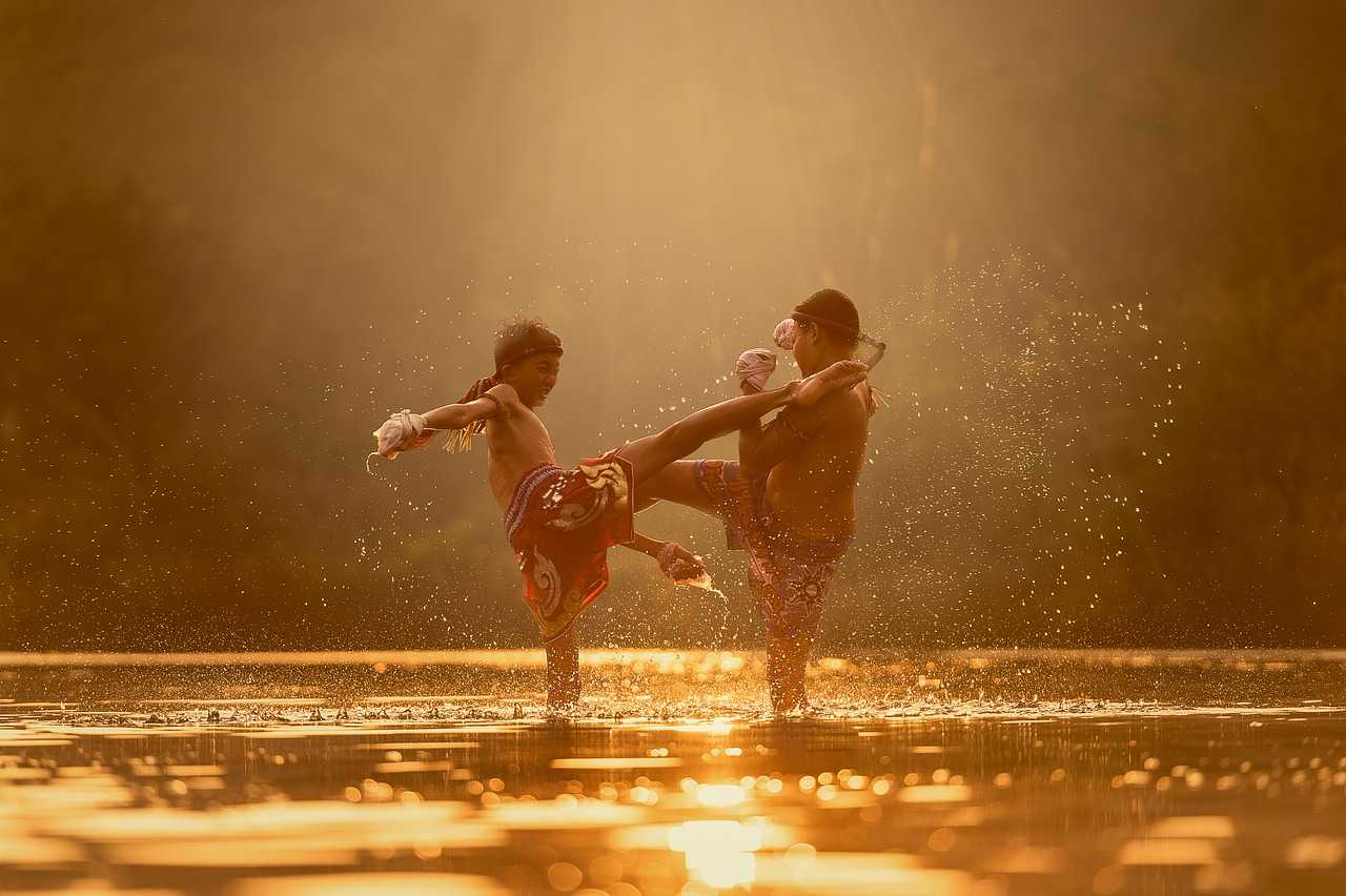 Children fighting in a river